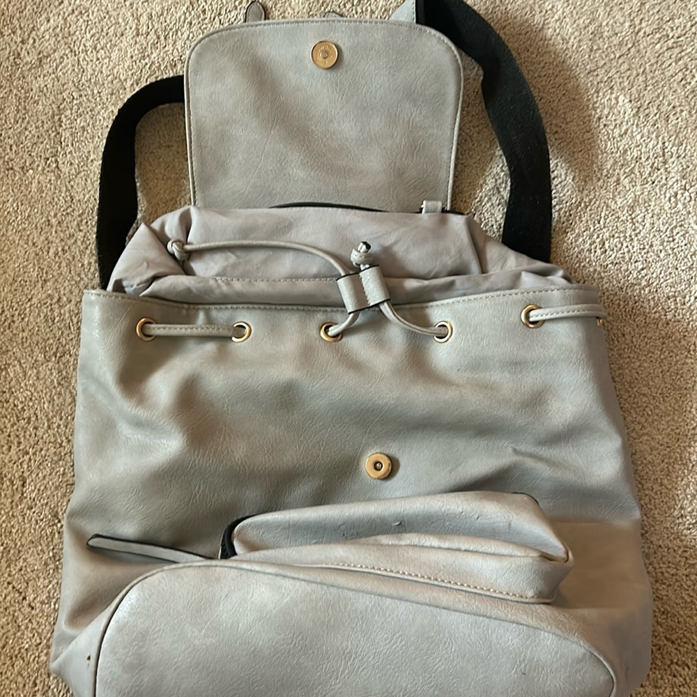 Backpack slightly used. Two pockets.
